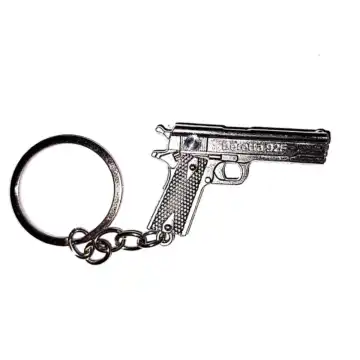 جاکلیدی جنگی کوچک طرح تفنگ کلت رنگ نقره ای کد 10476129